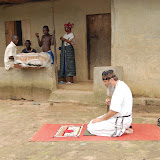  &ndash; On the road to Kabala from Freetown, we stop as Father is given a prayer mat and a place to say his prayers.…. © 2007 NHA Photos