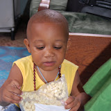  &ndash; Roo checking out toddler snacks from the States…. © 2007 NHA Photos