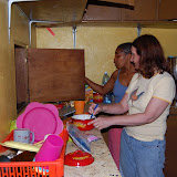  &ndash; Kadijah and mama Vicki cooking in kitchen at St. Laurence House…. © 2007 NHA Photos