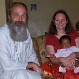  &ndash; Father S., Vicki and baby Ruth, a neighbor at St. Laurence House…. © 2007 NHA Photos