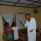  &ndash; Father teaching the girls how to yo yo…. © 2007 NHA Photos