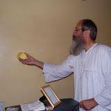  &ndash; Father catching the spider and taking it outside unharmed.…. © 2007 NHA Photos