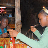  &ndash; Lucy and Ann Marie enjoying their dinner beach side at Ramada's…. © 2008 NHA Photos, James Mansaray: Photographer