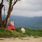  &ndash; © 2008 NHA Photos, James B. Mansaray, photographer. September 2008.... Fr. Seraphim observing time of prayer at beach