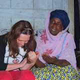  &ndash; Praying with Maria Barrie, © 2008 NHA Photos, James B. Mansaray, photographer. September 2008....
