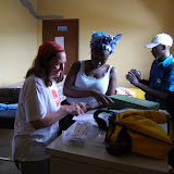  &ndash; Returning days later after the Flood, NHA brings the much needed parasite treatments to the clinic. . …. © 2008 September NHA Media Photos, Salu Bangura, photographer.