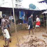 &ndash; Flood Damage: Kroo Bay cleans up after flood. …. © 2008 September NHA Media Photos, Salu Bangura, photographer. Little belongings to their name, they now found them covered in mud.