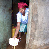  &ndash; Bailing out. Flood Damage: Kroo Bay cleans up after flood. …. © 2008 September NHA Media Photos, Salu Bangura, photographer.