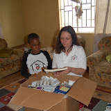  &ndash; Packing up medications, medical supplies, etc to take to Kroo Bay Clinic..…. © 2008 September NHA Media Photos, James B. Mansaray photographer.