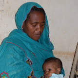  &ndash; Mother and Child, Kroo Bay, . …. © 2008 September NHA Media Photos, James B. Mansaray, photographer.