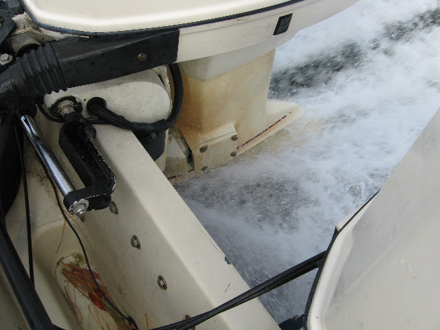 Photo: OMC gear case with A-V plate shown at speed