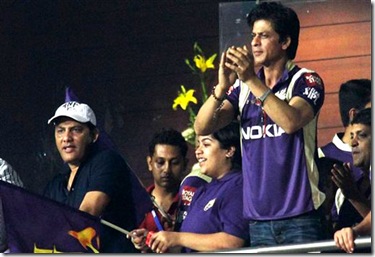 Kolkata Knight Riders team owner and Bollywood star Shahrukh Khan, right cheers as former India cricket captain-muhamad-azarudeen-ipl-2011