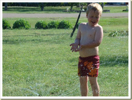 05-20-10 Zane in sprinkler 05