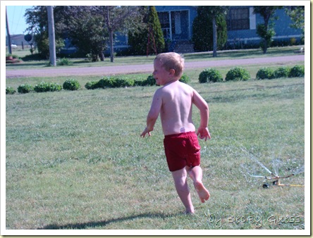 05-20-10 Zane in sprinkler 07