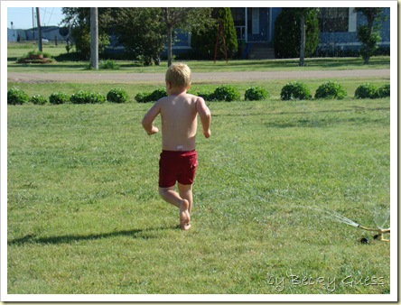 05-20-10 Zane in sprinkler 11