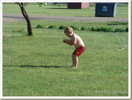 05-20-10 Zane in sprinkler 14