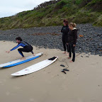 Trockenübungen am Strand mit Mietbrettern