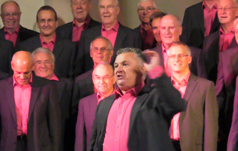 Chorus Director (pictured in front) of the Thames Valley Chorus (male voice choir).