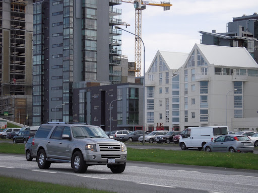Some of the most expensive real estate in the city and the building on the left can't even keep its facing tiles on. Building on the right's really really nice though.