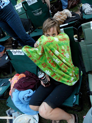 These are the blankets and general demeanor that we brought to the event. Everyone else in designer jeans and $1500 outfits and us in Santa blankets. This was one of the high points of our visit. Seriously.
