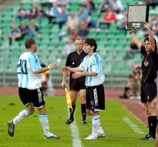 Argentina's Lionel Messi makes his debut for the national team.