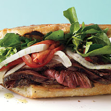Grilled Steak Sandwiches with Marinated Watercress, Onion, and Tomato Salad