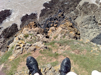 Dangling over the edge. It's a bigger drop than it looks in the piccy!
