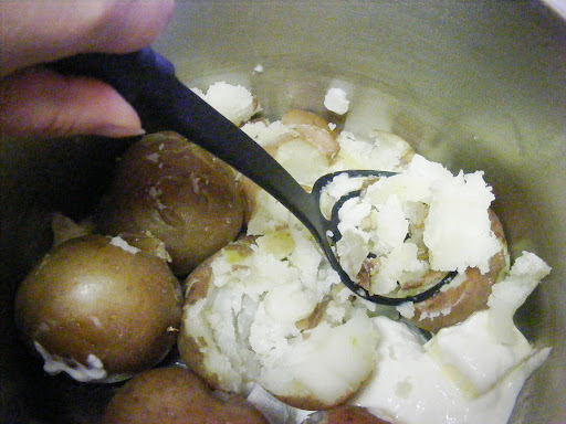 Start roughly smashing potatoes.