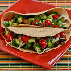 Spicy Beef and Black Bean Soft Tacos with Cucumber, Tomato, and Lime Salsa