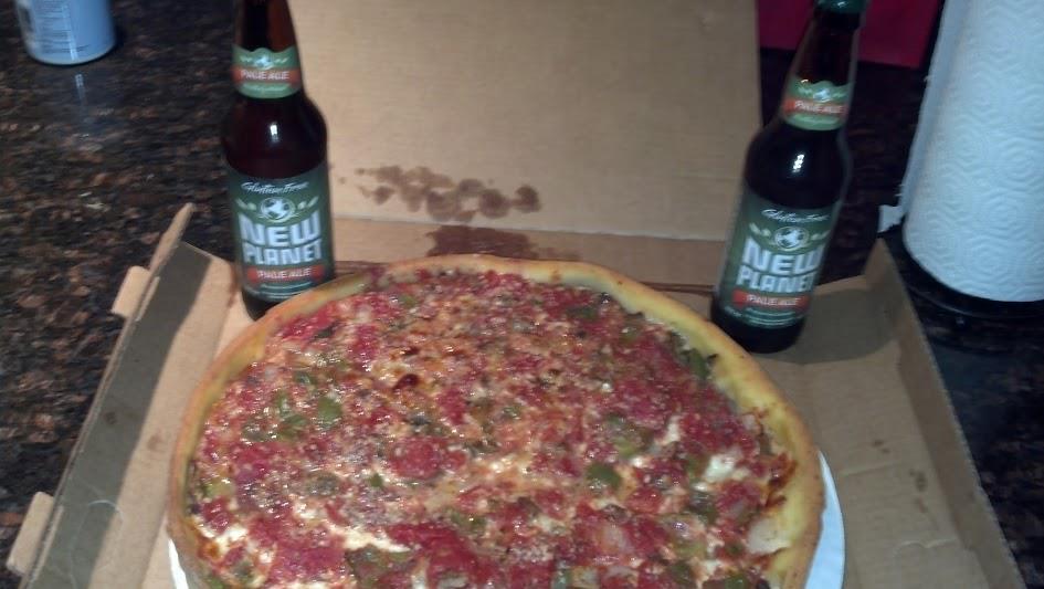 Amazing deep dish pizza and New Planet Beer