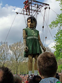 The girl being lifted to her feet