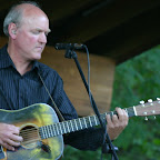 Scott Zylstra takes a lead break during Reed City Concerts in the Park, Summer 2007.