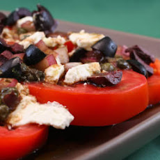 Sliced Tomato, Olive and Goat Cheese Salad with Onion-Caper Vinaigrette