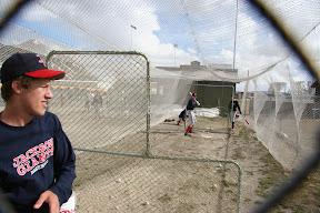 Sky Garnick throws batting practice to Patrick Renz
