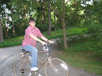 Riding bicycle.