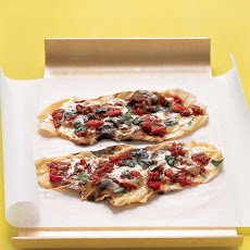 Grilled-Tomato Pizzettes With Basil and Fontina Cheese
