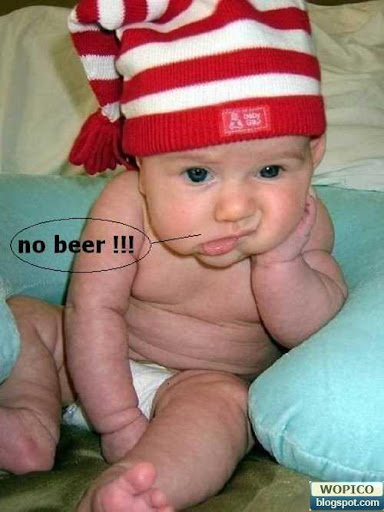Photo of bored baby with caption, 'no beer!!!'