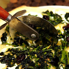 Pizza with Broccoli Raab, Roasted Onions and Olives