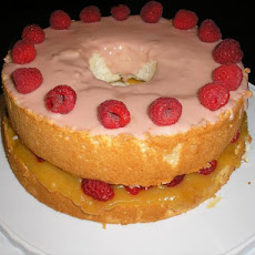 Lemon Angel Food Cake Filled With Lemon Curd and Fresh Raspberry