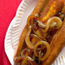 Cheese-Stuffed Hot Dogs with Spicy Onions