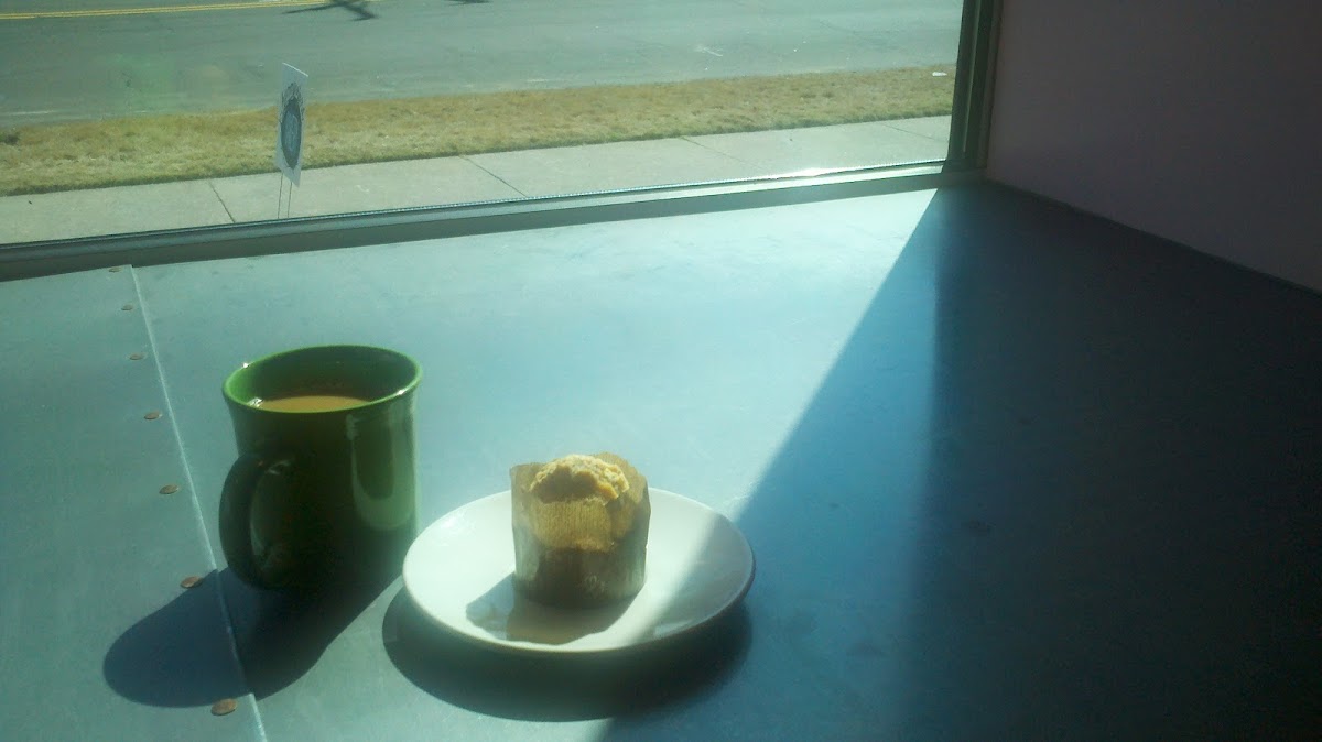 GF lemon poppyseed muffin and medium roast coffee. and sunshine.