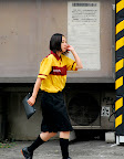Yellow and black clothes pass yellow and black striped wall gimmick.