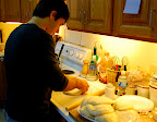 It was a make-your-own-pizza party, Jei making his here