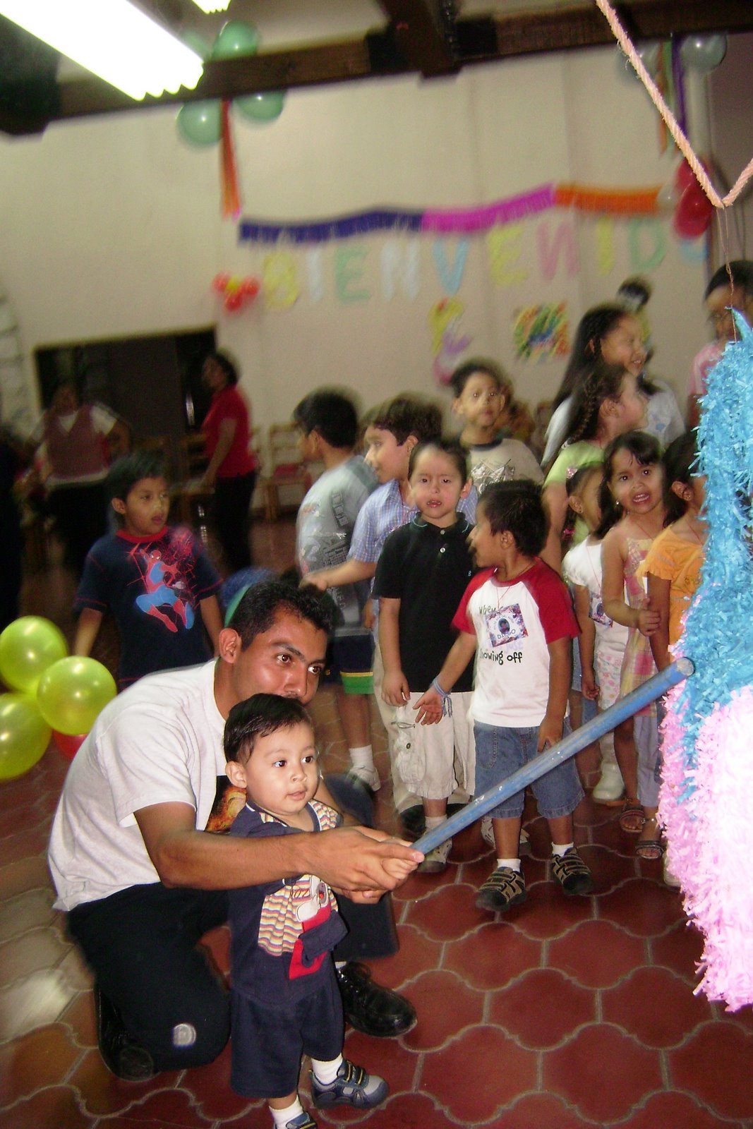 [Johnathan & Aristides hitting pinata[3].jpg]