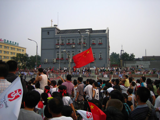 The view of the Olympic torch procession from Dazhalan, in central Beijing.