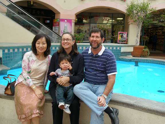 the grandparents (minus my daddy) at a fountain in the plaza.