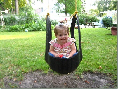 NASTYA IN TIRE SWING