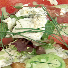 Heirloom Tomato Salad with Fresh Greens, Blue Cheese and Creamy Chive Dressing