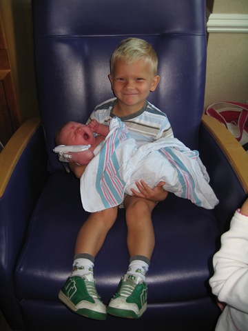 [Caleb holding Hannah[3].jpg]