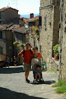 Going up the steep streets of Cortona toward the top